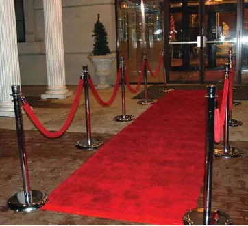 Red carpet runner rental with stanchions for a Chicago event entrance from AMJ Spectacular Events