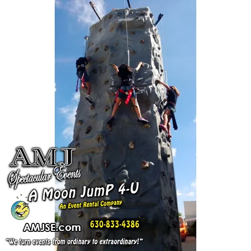 AMJ Spectacular Events 26-foot mobile Rock Climbing Wall with auto-belay harnesses for four climbers