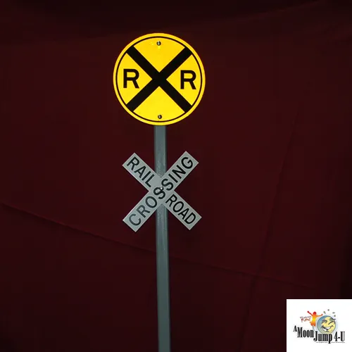 Authentic 6-foot yellow railroad crossing train sign rental from AMJ Spectacular Events in Chicago